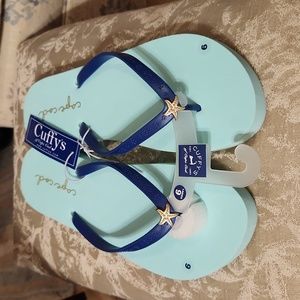 NWT Cuffy's flip flops with charm